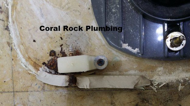 Rusted screws on new toto toilet repair, Palm Bay Plumber, Melbourne Plumber, Cocoa Beach Plumber, Vero Beach Plumber, Sebastian Plumber, kissimmee plumber, orlando plumber