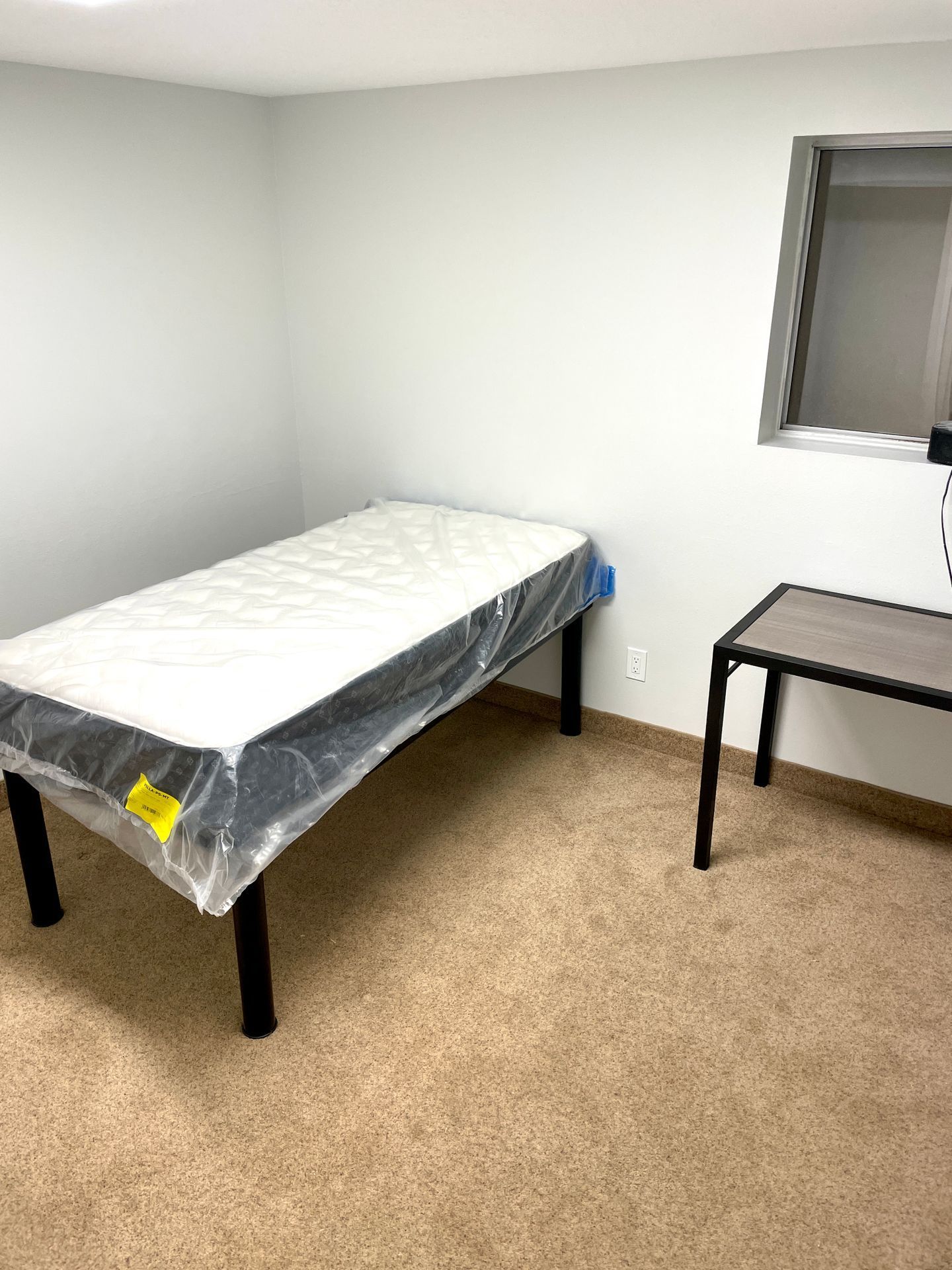 Student house near Utah Tech University with large bedrooms, in-unit laundry, a spacious kitchen, and a prime location next to campus in St. George, Utah.