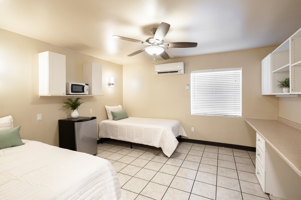 Dixie Cove student housing in St. George offers Utah Tech off-campus housing with spacious private and shared bedrooms. Features in-unit laundry, a pool, hot tub, and social common areas. Ideal off-campus housing in St. George for students