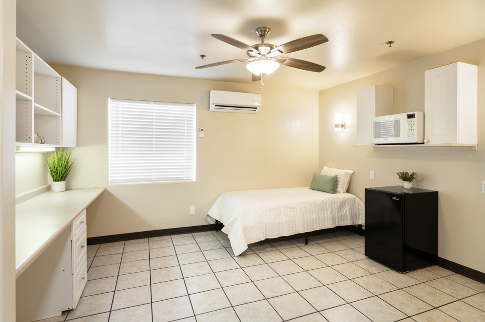 Dixie Cove student housing in St. George offers Utah Tech off-campus housing with spacious private and shared bedrooms. Features in-unit laundry, a pool, hot tub, and social common areas. Ideal off-campus housing in St. George for students