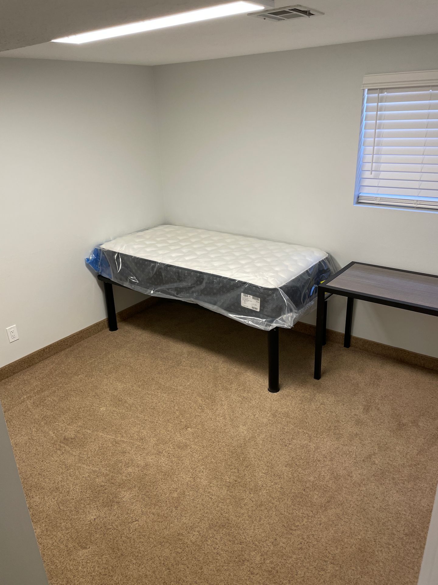 Student house near Utah Tech University with large bedrooms, in-unit laundry, a spacious kitchen, and a prime location next to campus in St. George, Utah.