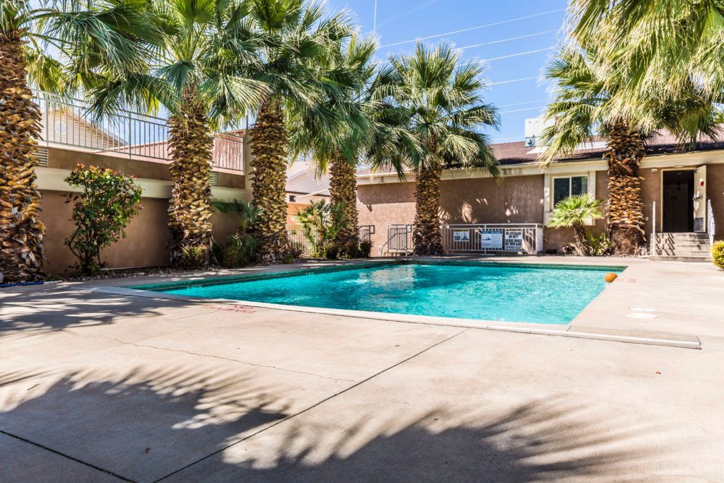 Dixie Cove student housing in St. George offers Utah Tech off-campus housing with spacious private and shared bedrooms. Features in-unit laundry, a pool, and social common areas. Ideal off-campus housing in St. George for students