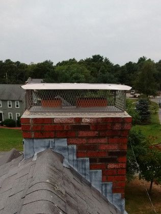 Installation of metal cover for chimney
