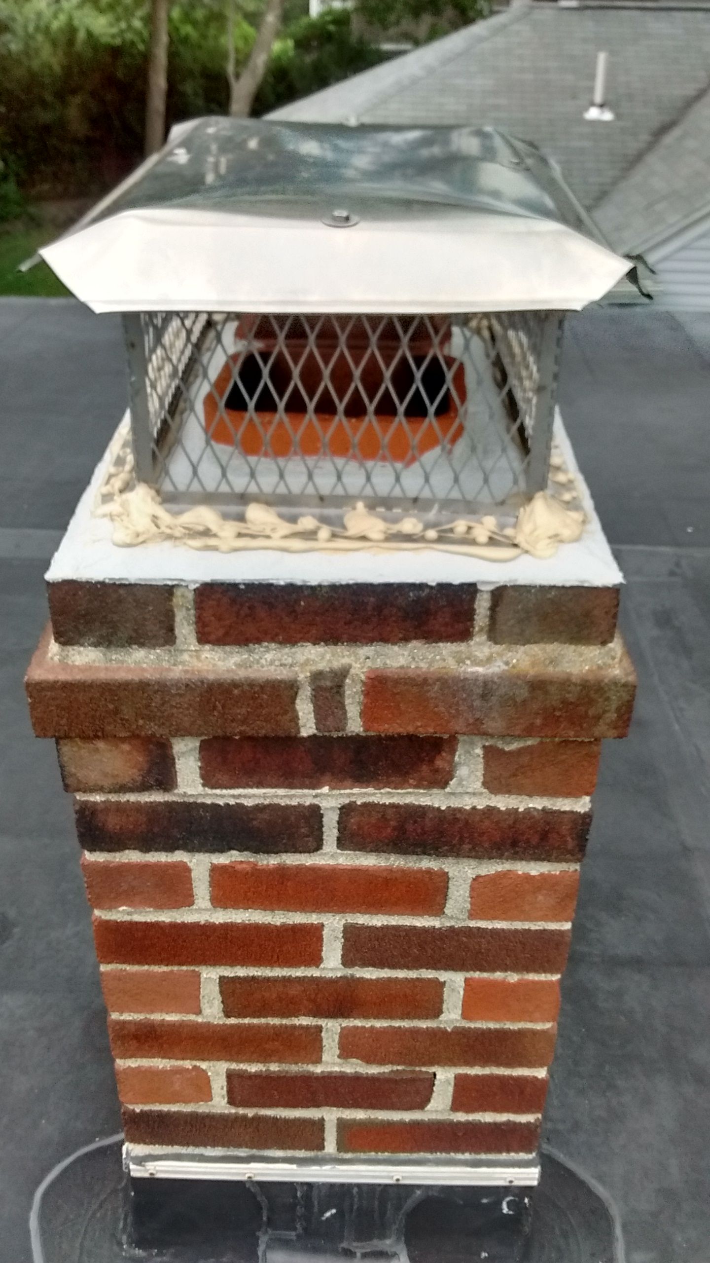 Fixing the brick chimney cover