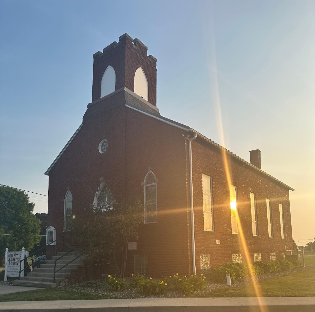 A church with the sun shining through the windows