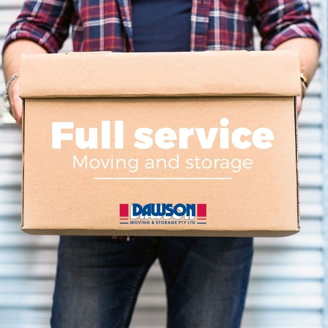 A Man Is Holding A Cardboard Box That Says Full Service Moving And Storage — Dawson Moving & Storage NQ in Mount St John, QLD