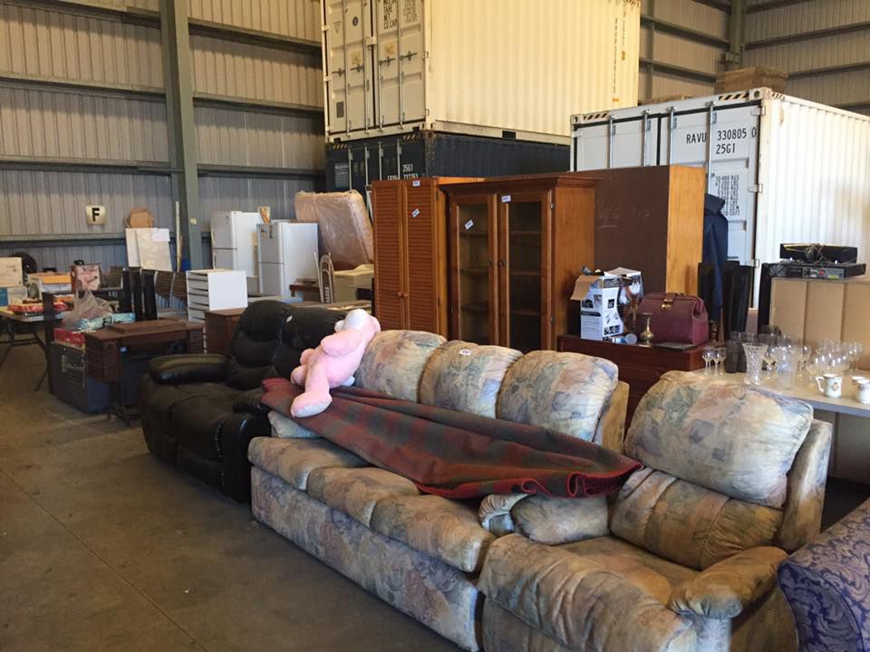 Big Warehouse Storage With A Lot Of Household Things — Dawson Moving & Storage NQ in Brisbane, QLD
