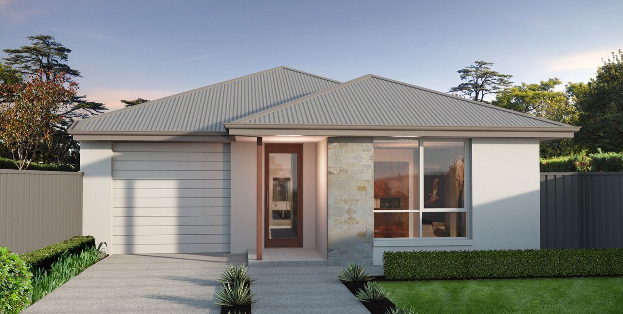 Modern, single-story house with gray roof, light exterior walls, and a driveway.