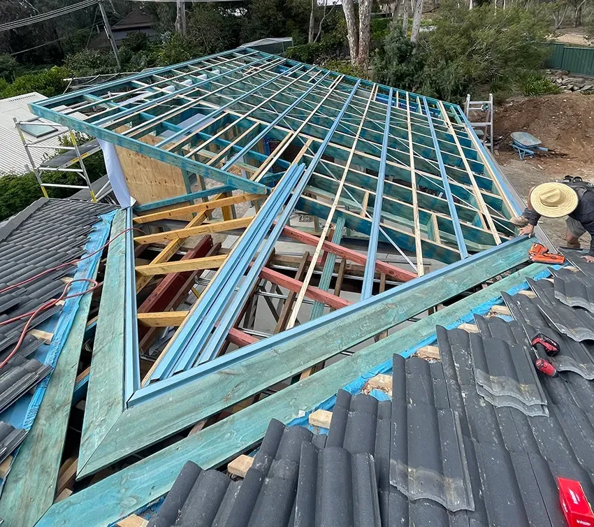A Tradie Working On A Roof Extension — Straight up Building Projects in Holt, ACT