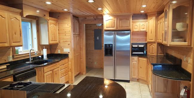 Full kitchen set of a luxury cabin