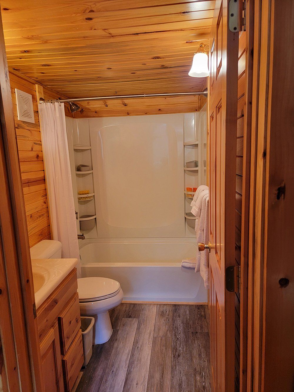 A comfort room with a bathtub