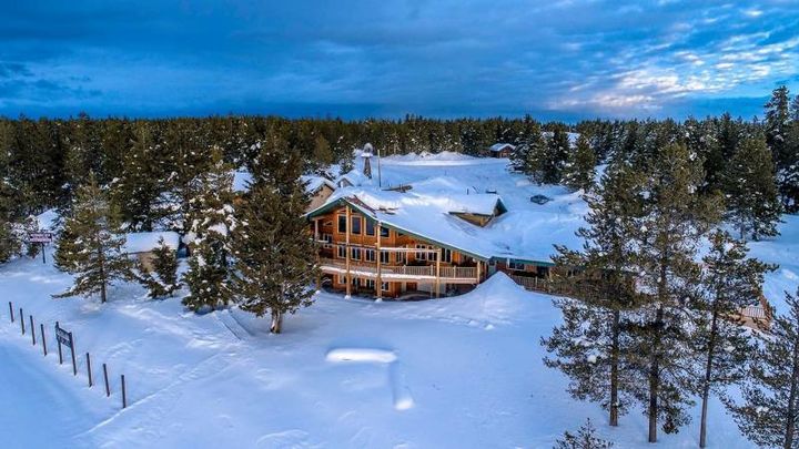 snow covered cabin