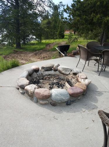 Fire pit outside a cabin