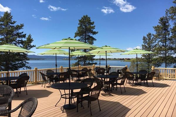 Tables and chairs with umbrellas