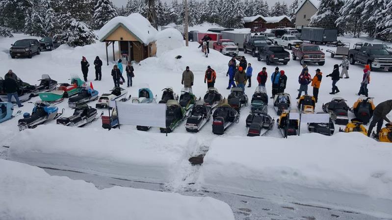 Guests and jet skis outside a building