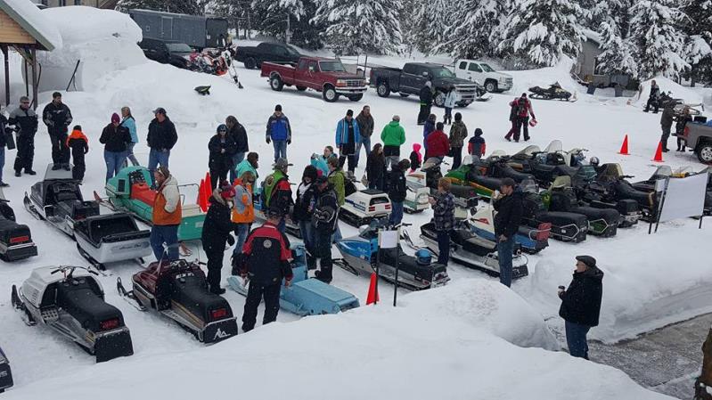 Guests preparing to ride their snowmobiles