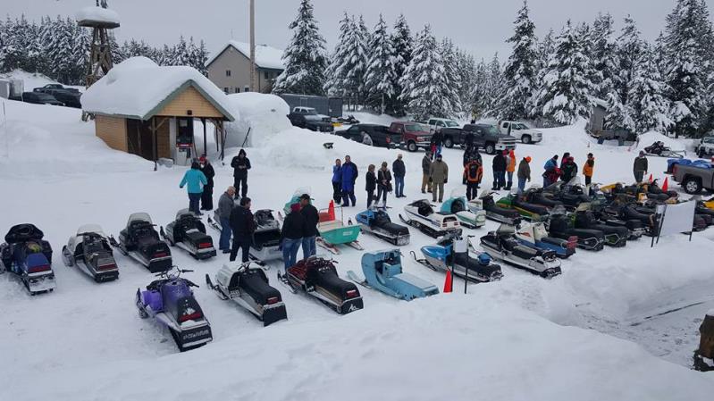 Guests preparing to ride their snowmobiles