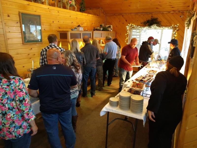 People lining up on a buffet