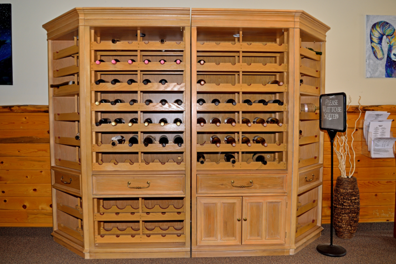 Wooden cabinet with wine inside