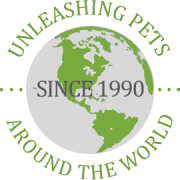 A logo for unleashing pets around the world since 1990