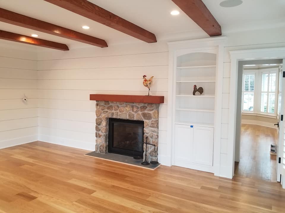 Fireplace With Stone Wall Design — Poughquag, NY — Mino’s Painting Inc