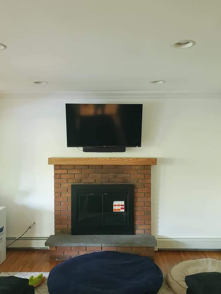 Fireplace With Brick Walls — Poughquag, NY — Mino’s Painting Inc