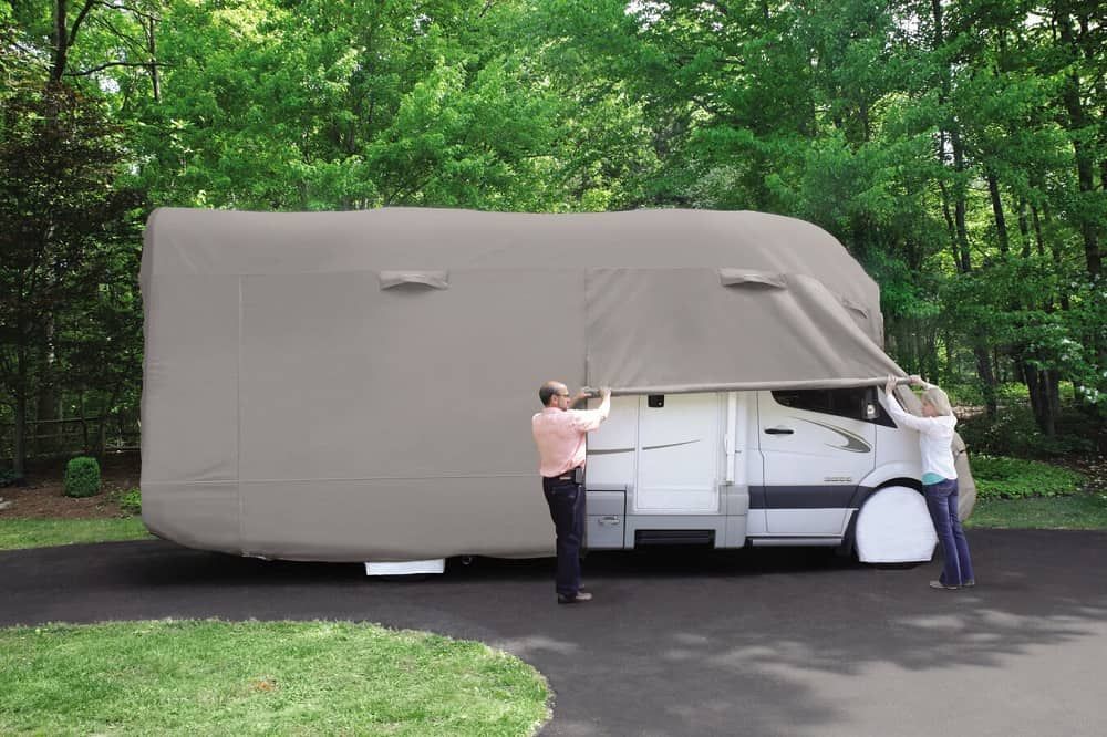 Couple covering an RV