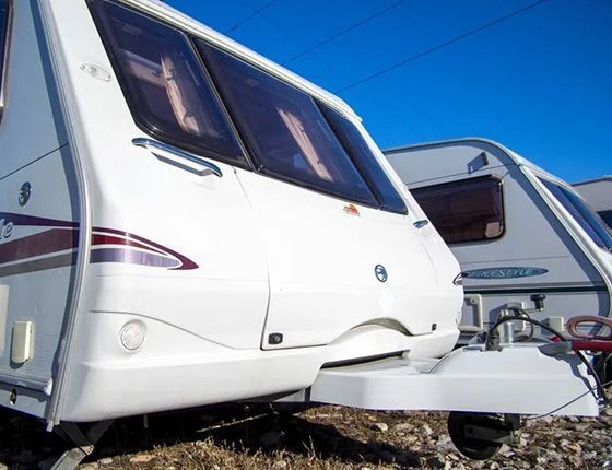 White caravans parked outdoors