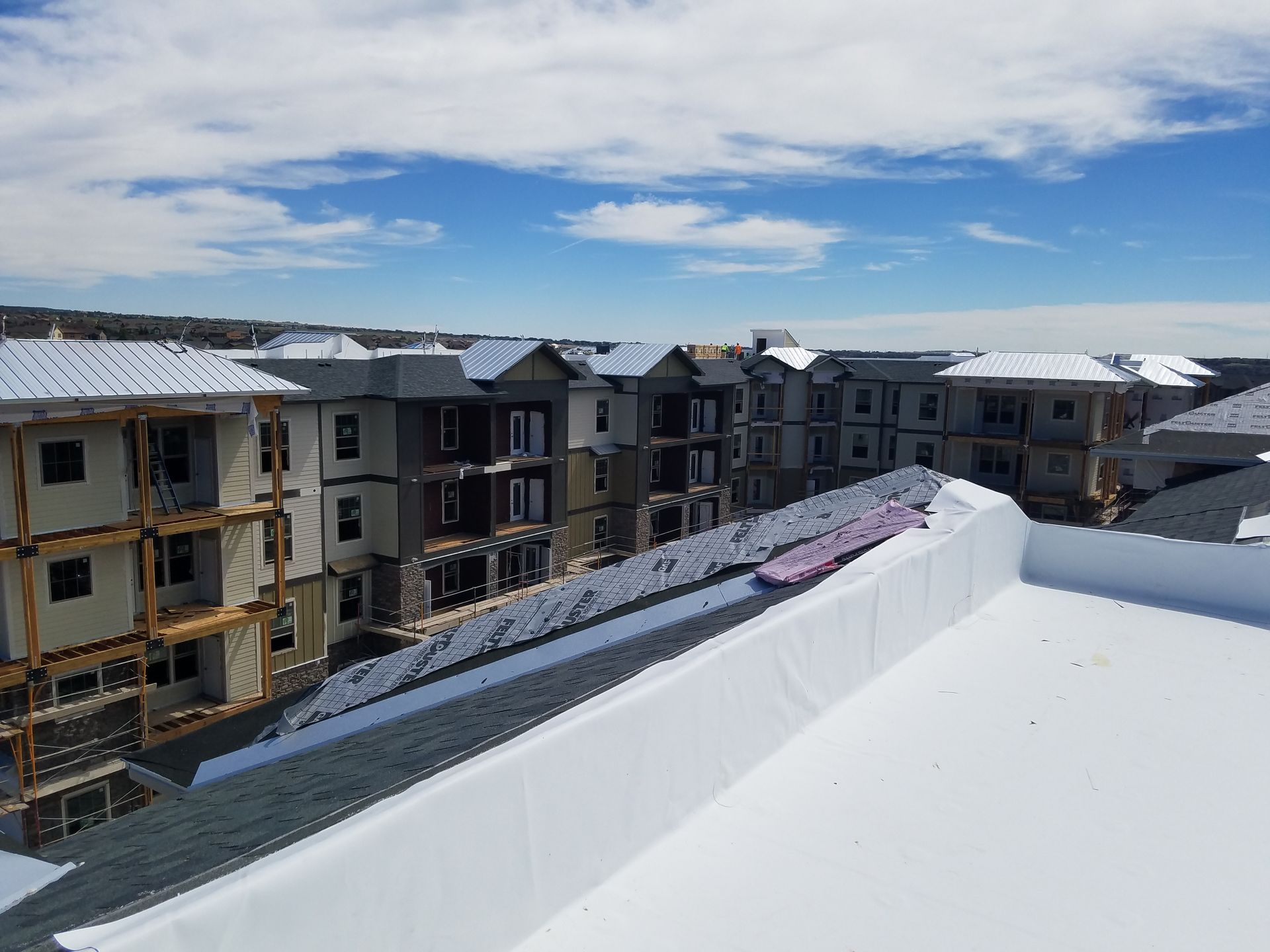 Commercial roofing new roof install on an apartment complex in Colorado Springs, CO