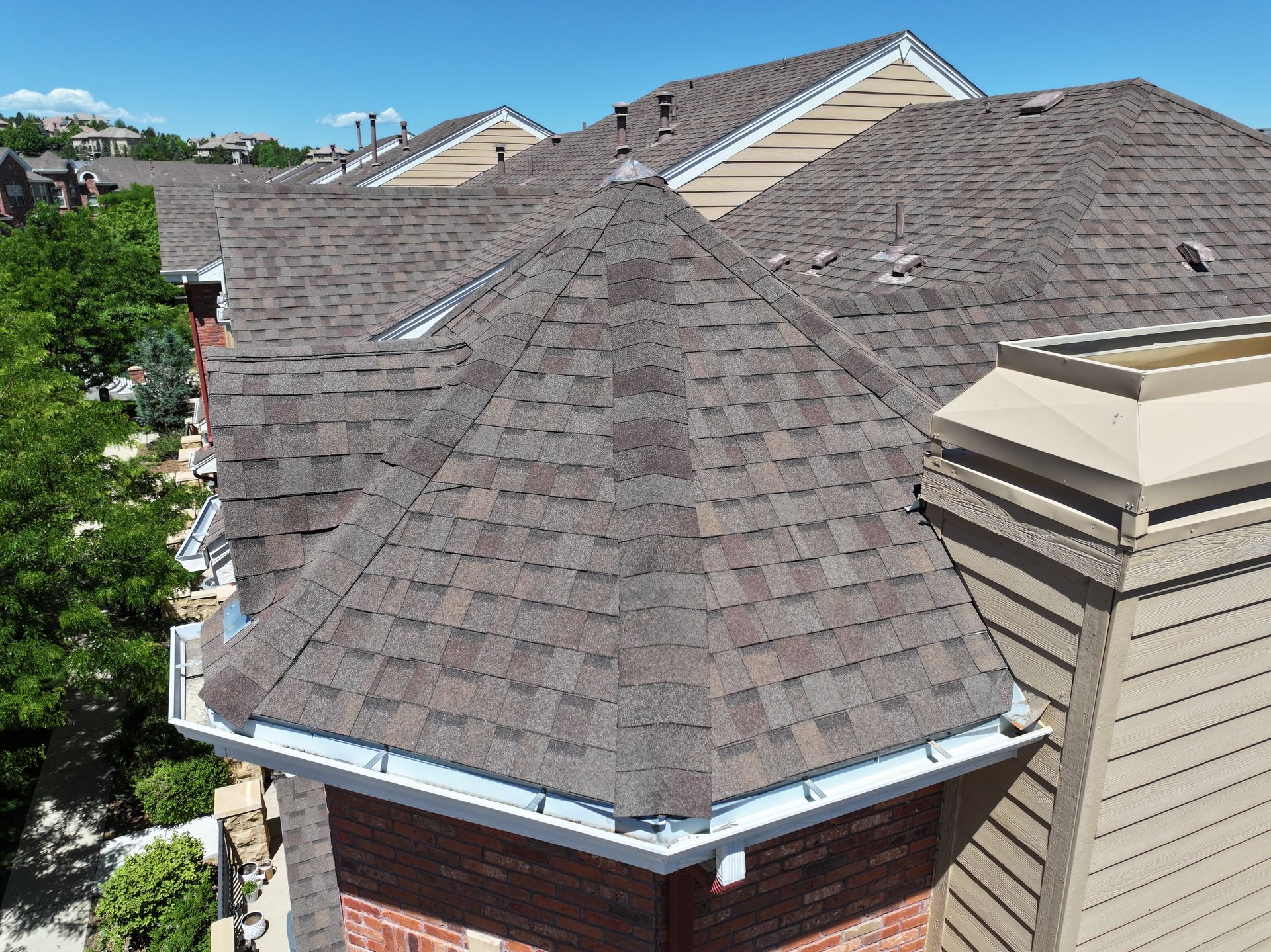 Reroofing a condominium complex in an HOA in Southern Colorado, certified drone inspection