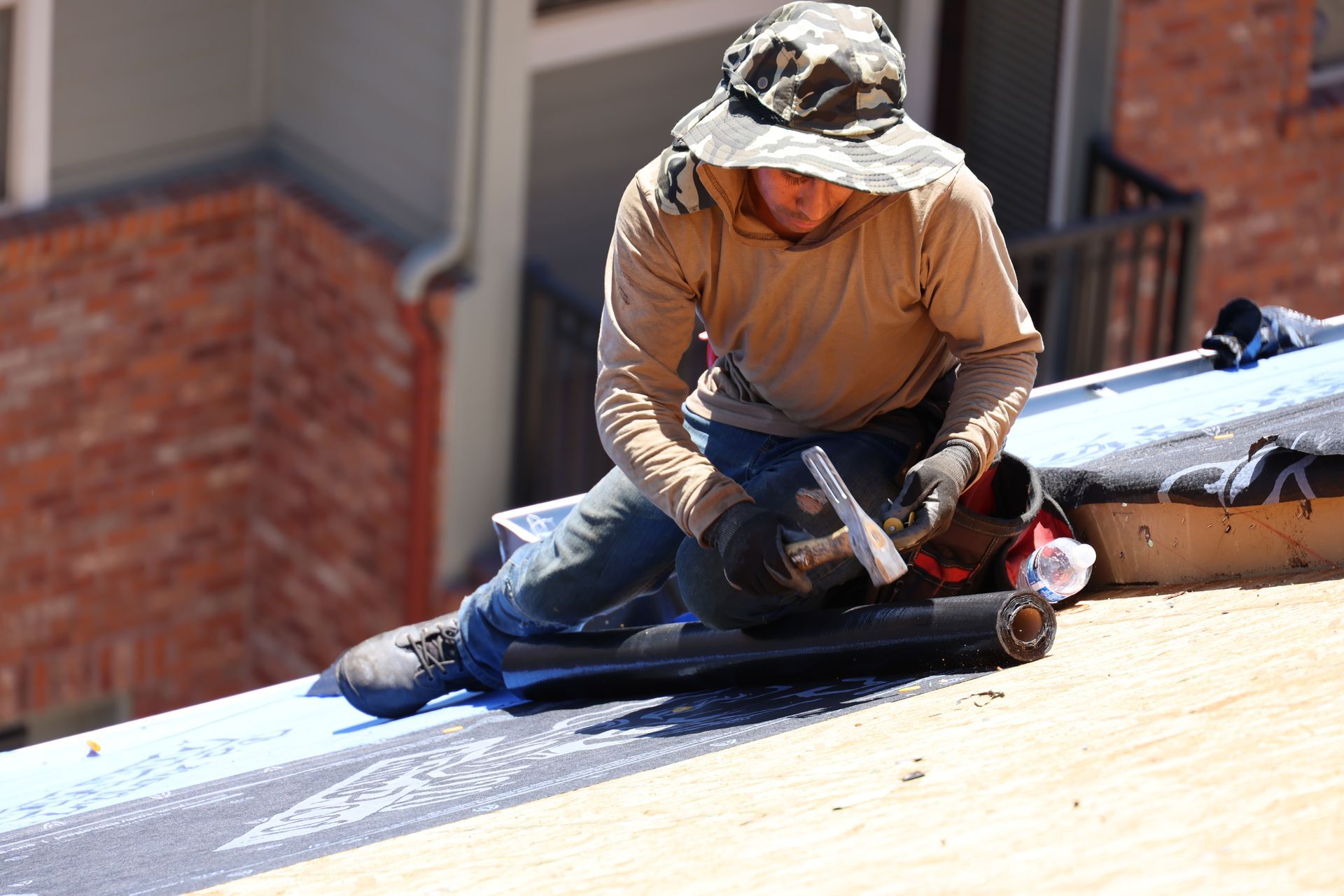 Commercial reroof installing synthetic underlayment for a condominium in an HOA in southern CO