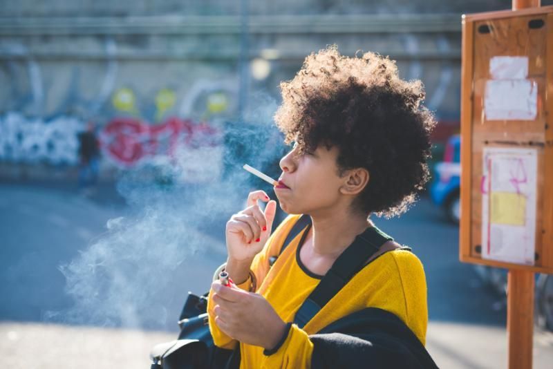 woman smoking a cigarette