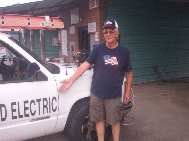 Tommy McDonald Showing a Service Vehicle — Albuquerque, NM — McDonald Electric