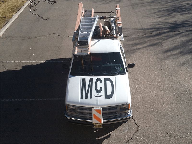 MCD Sign in Front of Service Vehicle — Albuquerque, NM — McDonald Electric