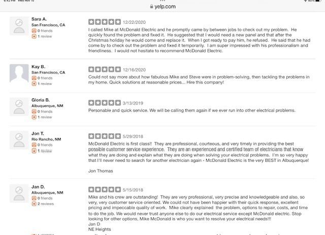 Yelp reviews for McDonald Electric with five-star ratings, praising service and professionalism.