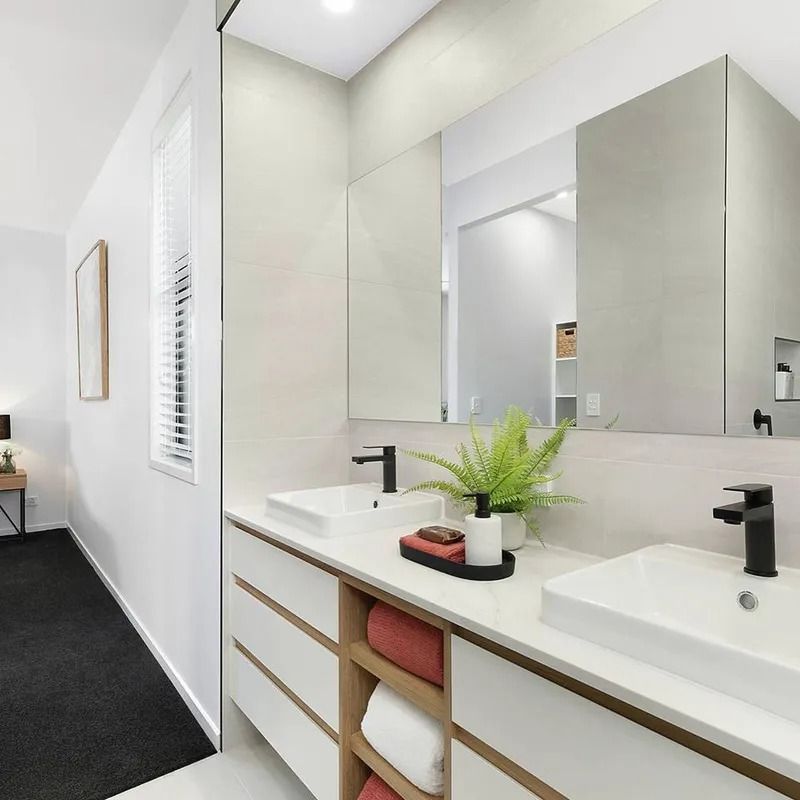 A Bathroom With Two Sinks And A Large Mirror  — Norm Evans Floors Pty Ltd in Kunda Park, QLD