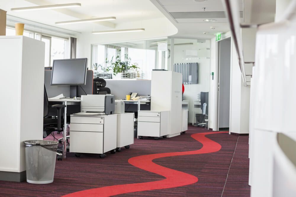 An Office With a Red Carpet and a Swirl in the Floor — Norm Evans Floors Pty Ltd in Nambour, QLD
