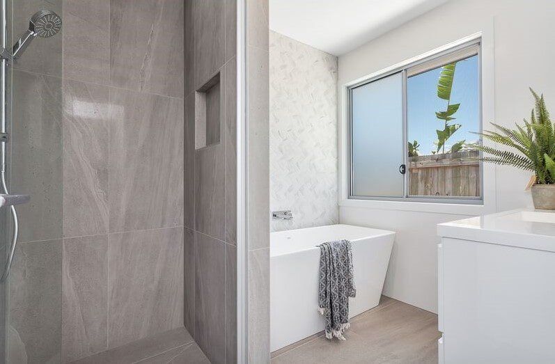 A Walk In Closet With Lots Of Shelves And Drawers  — Norm Evans Floors Pty Ltd in Kunda Park, QLD