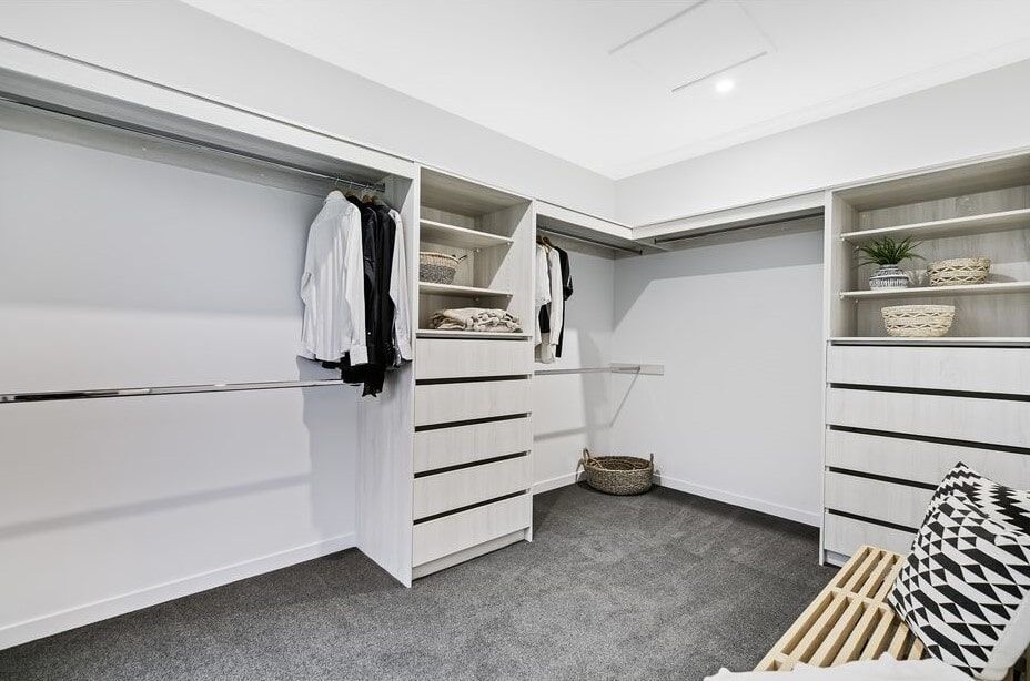 A Bedroom With A Bed , Nightstand , Chair And Window  — Norm Evans Floors Pty Ltd in Kunda Park, QLD