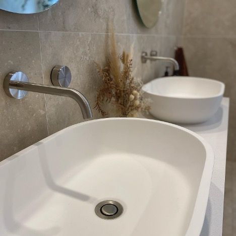 A Bathroom with Two Sinks and a Mirror — Corrimal Discount Tiles and Bathroomwear in East Corrimal, NSW