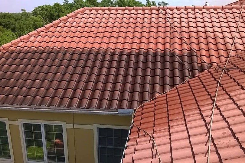 A roof with a lot of red tiles on it