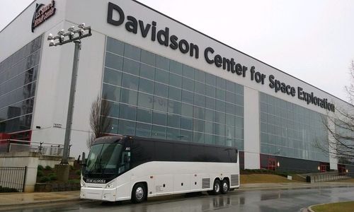 Bus in front of space exploration | Tuscaloosa AL | Tuscaloosa Charter Service