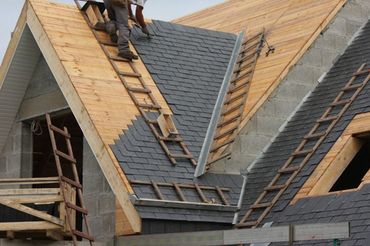Roofer Roof in slate tiles Modern House