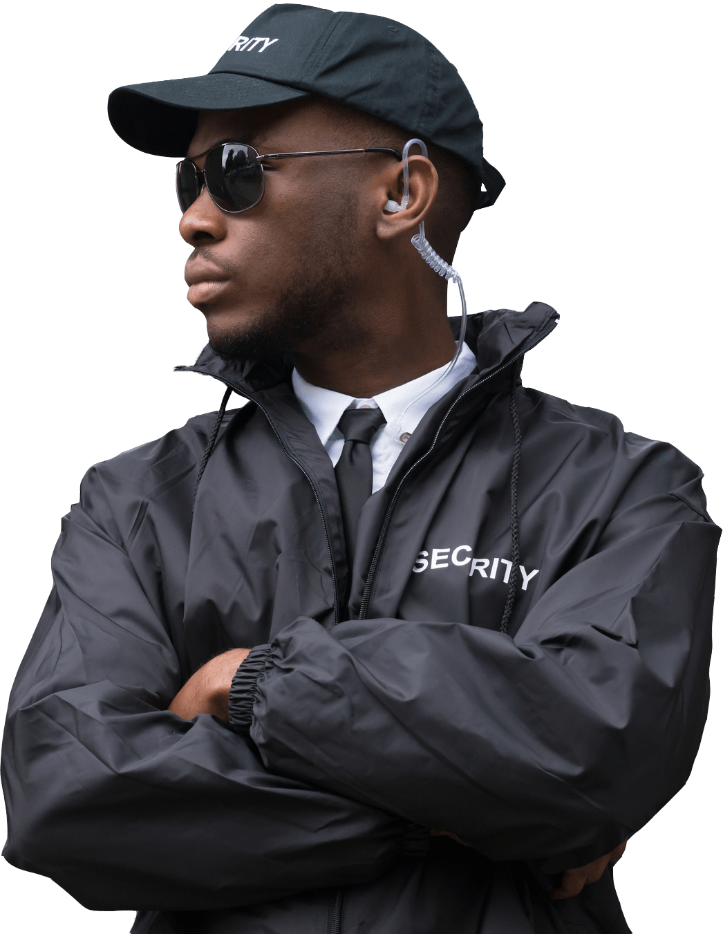 Security guard in black uniform with crossed arms and earpiece.