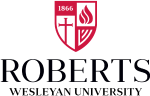 Roberts Wesleyan University logo: a red shield with a cross, flame, and stripes above the university name.