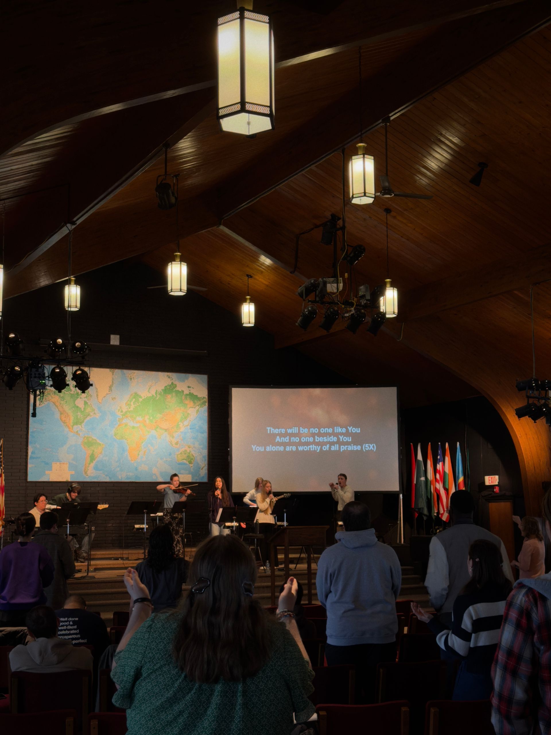 students leading worship during a chapel service 