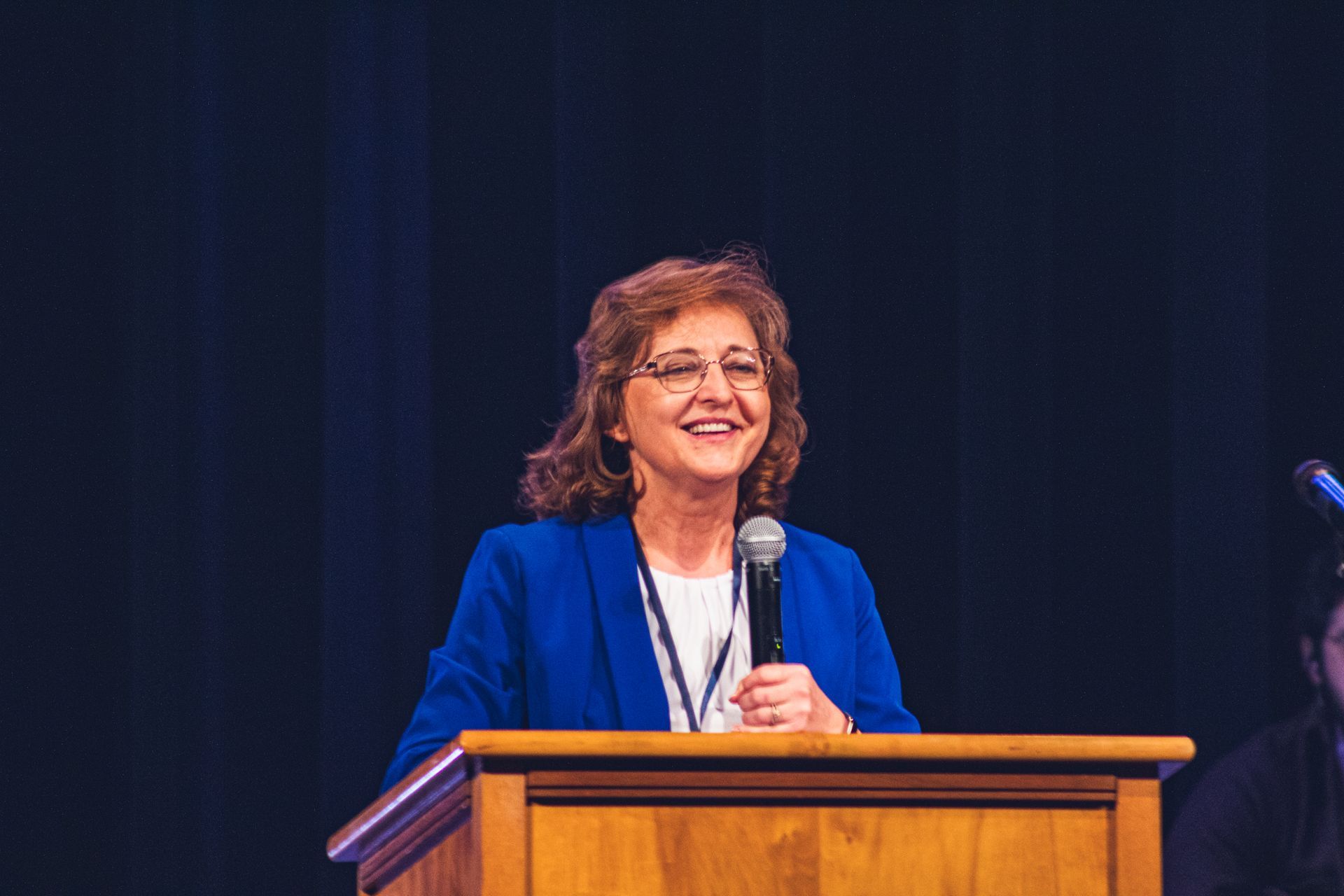 a picture of the provost speaking at 100th event 