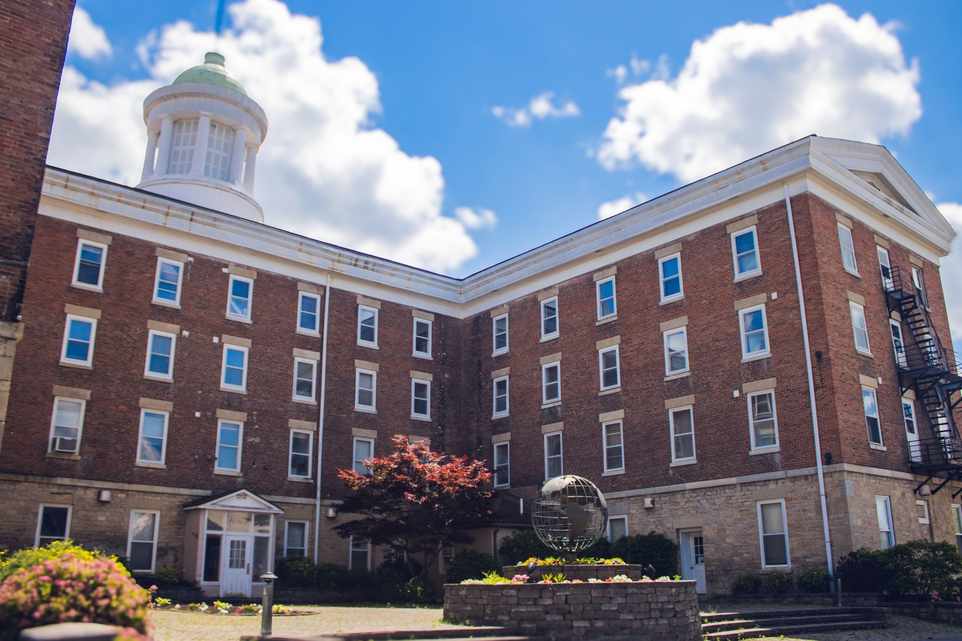 a picture of Spencer Hall building with globe