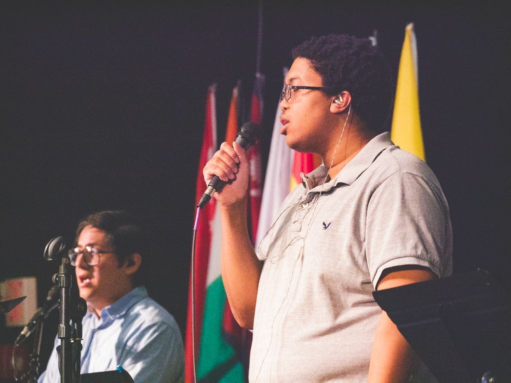 a student singing in the worship team