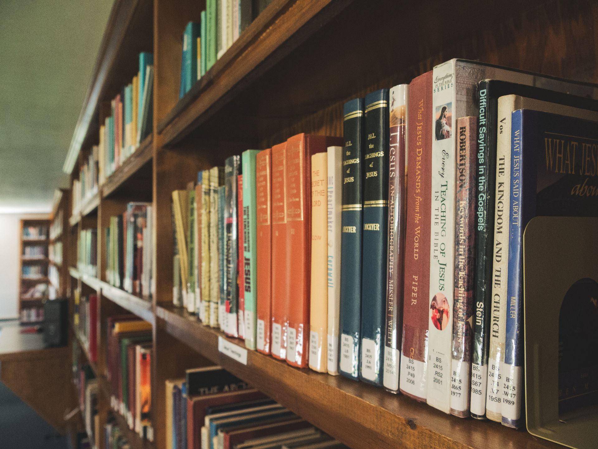 a rack of books in a library
